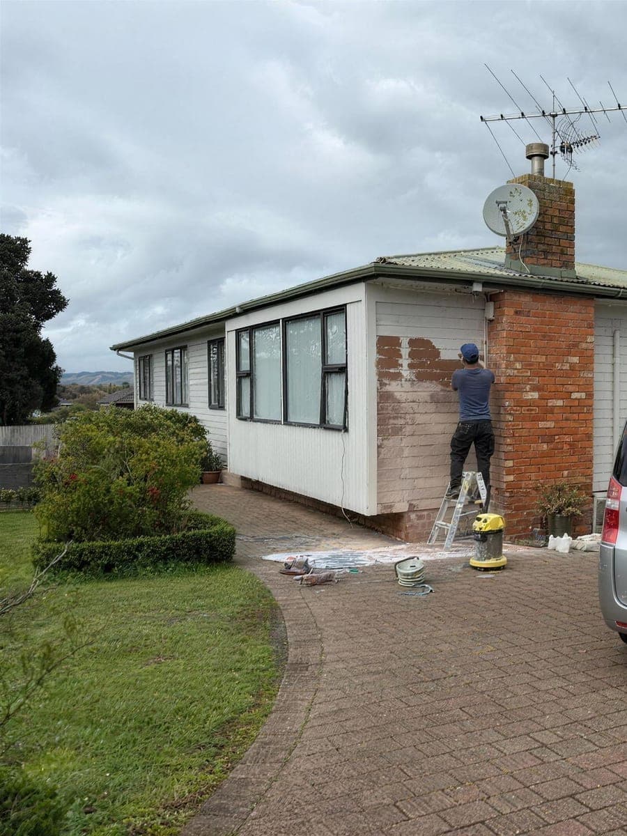 EGP van and crew set up outside a home being prepared for repainting